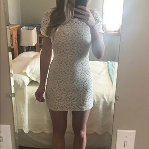 White and cream bodycon lace dress. Size medium
